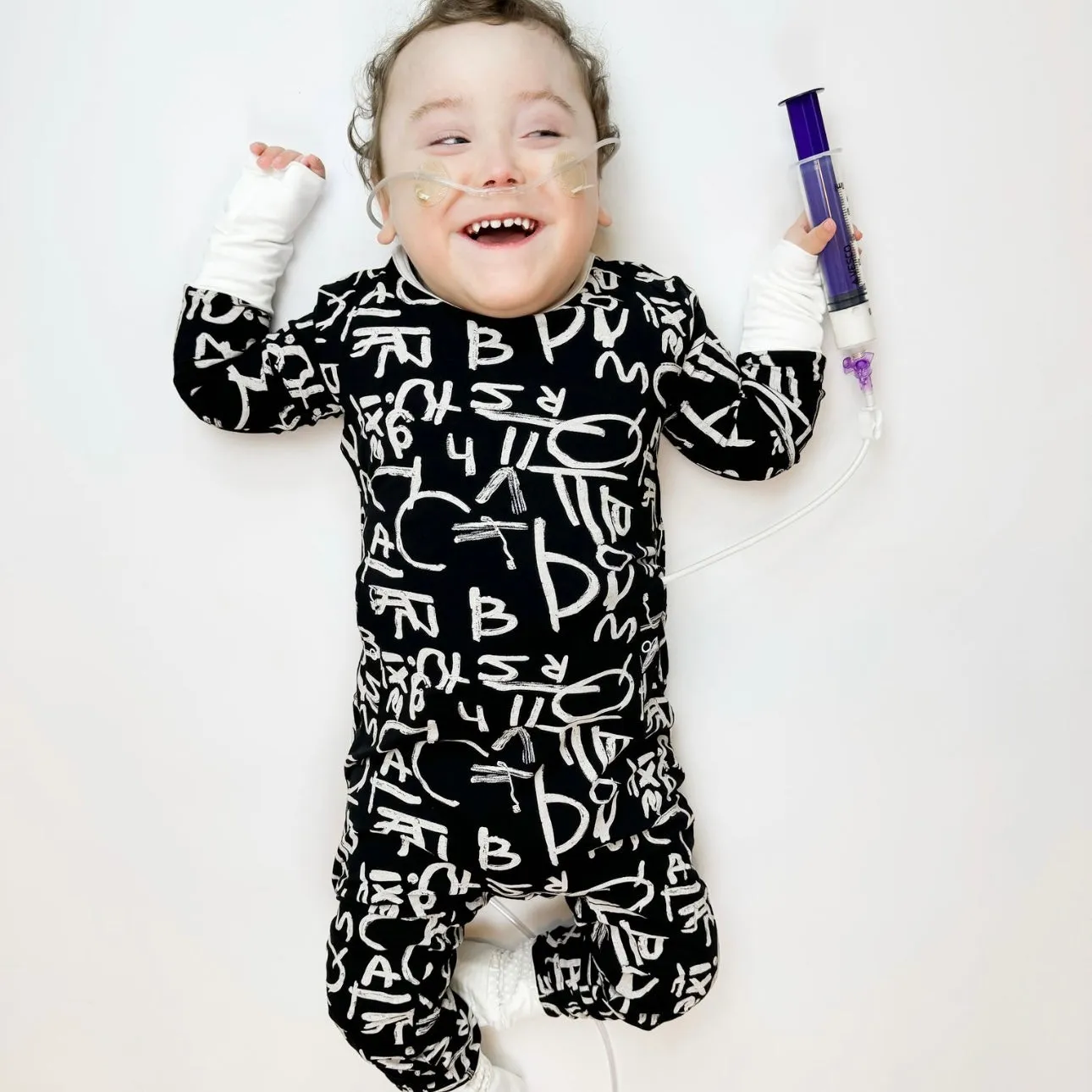 Alphabet for Autism Adaptive Tube Access with snaps Kid's Day to Night Romper