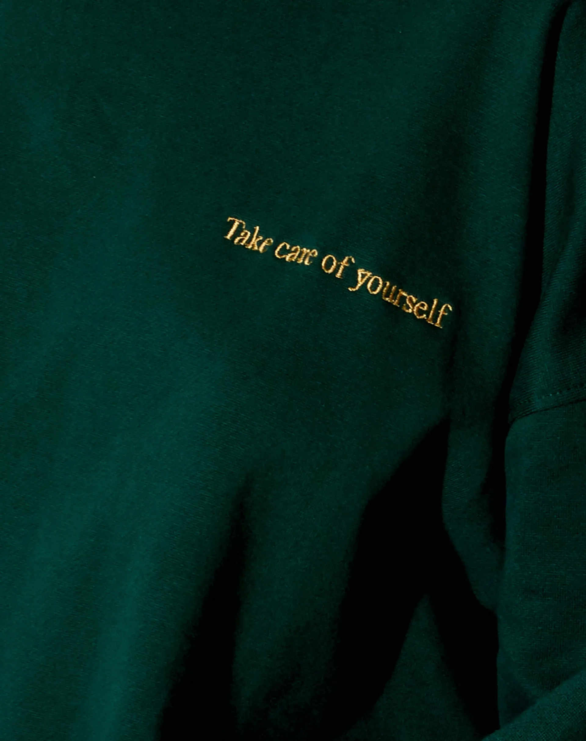 Glo Sweatshirt in Bottle Green with 'Take Care Of Yourself' Embro